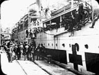 Veterans unloading -- Welcoming hospital ship ca. 1918 - 1925