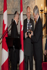 [Prime Minister Stephen Harper is given an award at the Estée Lauder House in New York City] 20 September 2011