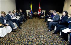 [Prime Minister Stephen Harper hosts a bilateral meeting with Colombian President Álvaro Uribe Velez while in Lima, Peru] 21 November 2008