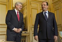 [Prime Minister Stephen Harper and French President François Hollande chat following a working luncheon at the Palais de l'Élysée in Paris, France] 14 June 2013