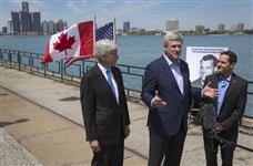 [Prime Minister Stephen Harper, joined by Rick Snyder, Governor of Michigan, and Murray Howe, announces that the future publicly owned bridge between Windsor, Ontario and Detroit, Michigan, will be named the Gordie Howe International Bridge, in honour of hockey legend Gordie Howe in Windsor, Ontario] 14 May 2015