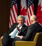 [Prime Minister Stephen Harper participates in a moderated discussion in the Goldman Sachs Auditorium with Gerard Baker, Editor-in-Chief of the Wall Street Journal, during his visit to New York City for the United Nations General Assembly in New York City] 24 September 2014