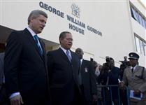 [Prime Minister Stephen Harper and Prime Minister Bruce Golding leave the Jamaican House of Parliament after addressing a joint session in Kingston, Jamaica] 20 April 2009