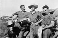 [S.S. Shulemson (second from left) with Phil Reuben, William Corber and Ben Spizer, 7th (Montreal) Field Battery, R.C.A., P tawawa, etawawa Ont., 22-30 June, 1934]