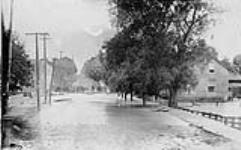 [Partly flooded street, Oshawa, ON] c 1880-1930