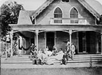 Group at Belmere, including H.R.H. Prince Arthur, Lord and Lady Lisgar: On the verandah June, 1870