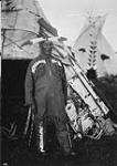 An Indian in native costume in the play "Hiawatha" held near Sault Ste. Marie, Ontario. c 1920 c 1920