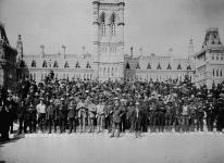 Canadian voyageurs in front of the Parliament Buildings, detail from "Canadian Nile Contingent" 1884