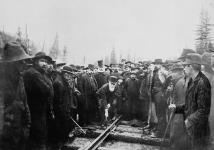 Hon. Donald A. Smith driving the last spike to complete the Canadian Pacific Railway 7 Nov. 1885.