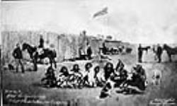 [Group of First Nations seated at site of Fort Calgary, post of the North-West Mounted Police]. Original title: North-West Mounted Police, Fort Calgarry. First photo taken in Calgary. 1878