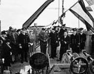 Mayor Fred W. Storey of Moncton speaking during the commissioning of the corvette H.M.C.S. MONCTON into the Royal Canadian Navy, Saint John, New Brunswick, Canada, 25 April 1942 Apri1 25, 1942.