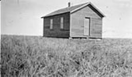 Standard two-room house erected for new Jewish settlers, Sonnenfeld Colony, Oungre, Saskatchewan 1928