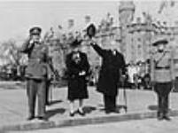 Rt. Hon. W.L. Mackenzie King leading farewell cheers for the outgoing Governor General of Canada, the Earl of Athlone 16 Mar. 1946