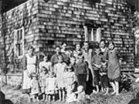 Mrs. Hart, Mrs. Wollenberg and their families making their home with Mrs. Siebert and family pending settlement on farms of their own. Minitonas, Manitoba 1928