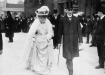 Sir Wilfrid and Lady Laurier going to the Parliamentary luncheon, Colonial Conference. Hon. L.P. Brodeur in the background 1907