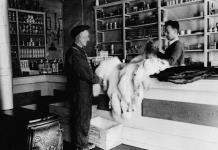 Archie White trading in furs for stores from Andy Reid, manager of the Hudson Bay Company 16 Aug. 1937