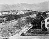 Side view of Brigham Young's house and his wives's houses ca. 1871