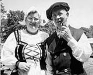 Mr. & Mrs. John Tamming dressed in costumes of their homeland, representing the many Dutch-Canadian residents in the Strathroy area of Ontario who enjoyed centennial celebrations 1960