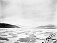 Lat. 79ï 23'. Looking towards the Head of Franklin Pearce [Pierce] Bay, [N.W.T.], 8th August, 1875. Water pools on the floe frozen over 18 Aug. 1875