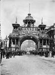 Arch erected by Canada, in honour of the Coronation of King Edward VII. On front of arch: "Canada - Britain's Granary. God Save Our King and Queen". On reverse: "Canada: Free Homes for Millions: God Bless the Royal Family." July, 1902