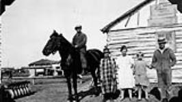 Group including Jan Szplett, German Lutheran from Poland, who settled near St. Walburg, Saskatchewan. c 1928 1928