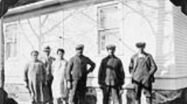 Paul Kretchnear, German Roman Catholic from Germany, settled near St. Walburg, Saskatchewan. Photo shows family beside the house 1929