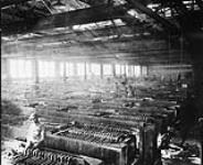 Italian immigrants working in the zinc tank rooms c 1918