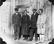 Mr. & Mrs. Jan Bator, [recent Polish immigrants] with their son and daughter on their farm near Ethelbert, Manitoba [1930]