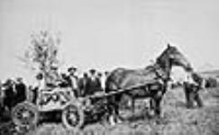 Rt. Hon. W.L. Mackenzie King driving a wagon 27 July 1933