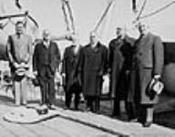 Rt. Hon. W.L. Mackenzie King and colleagues aboard S.S. EMPRESS of Australia en route to the Imperial Conference 1 May 1937