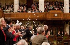 [Liberals throw paper after the government is defeated in the House of Commons] 25 March 2011