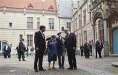 [Jan Pieter Balkenende, the Prime Minister of the Netherlands, and Prime Minister Stephen Harper chat with Elsie Dandy, a nurse in the Canadian military during World War II, and Canadian Veteran Andre Rousseau in downtown Bergen op Zoom in the Netherlands] 6 May 2010