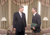 [Prime Minister Stephen Harper is greeted by Prince Edward Island Premier Pat Binns before a fundraising dinner in Charlottetown, PEI] 28 April 2006