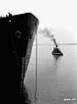 The cargo ship, "Fort Ville Marie", arriving back to the Canadian Vickers yard after its successful launch 11 Ot. 1941