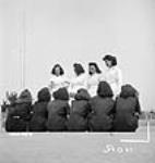 Female munitions workers enjoy a break at the Dominion Arsenals Ltd. plant 24 août 1942