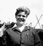 Portrait of female pipe fitter's assistant, Viola Peters May 1943
