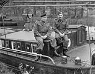 Maj.-Gen. Hoffmeister and others sitting on a Dutch Canal boat 16 May 1945