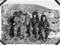 Inuit children on a komatik 1922
