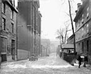 Unidentified alley (street scene) ca. 1920s