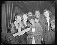 Sarah Vaughan (centre) with fans and friends at the Standish Hall Hotel, Hull, Quebec ca. 1950.