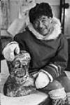 In the Print Shop, Cape Dorset, N.W.T., [(Kinngait), Nunavut], April 1968 [Etidloi Kigutaq brought a carving to the Coop] April 1968.