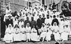 Group pose of the medical staff of Hopital Gallice in Cannes, France c 1916