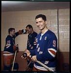 Hockey captains have a new look. Andy Bathgate Dec 28, 1963