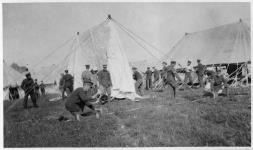 Soldier erecting tents n.d.
