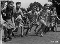 School Children run races in Ottawa Schoolyard 1957