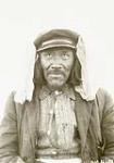 Portrait of an unidentified Inuk man wearing a hat and a white cloth on his head [graphic material] 1926