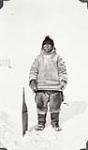 Unidentified Inuk male with a club [graphic material] 1936