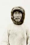 Portrait of an unidentified Inuk man with a pipe in his mouth [graphic material] 1926