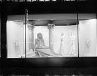 Mannequins in the display window at Simpsons dressed like Caesar and Cleopatra 17 Aug. 1946