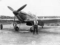 S/L E.A. McNab, Commanding Officer, with a Hawker Hurricane I aircraft of No.1 (F) Squadron, R.C.A.F. [graphic material] : Northolt, England, 12 September 1940 September 12, 1940